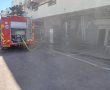 צוותי כיבוי פועלים בשריפה בארובה של בית עסק באשדוד