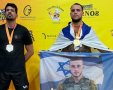 דויד אביסרור על הפודיום לאחר הזכיה